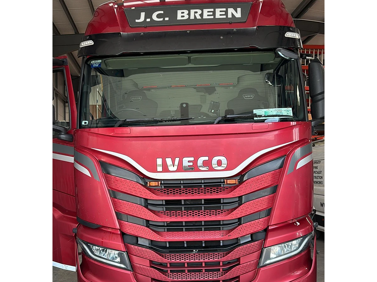 Red Iveco truck cab with a newly fitted windscreen by Mobile Plant Glass