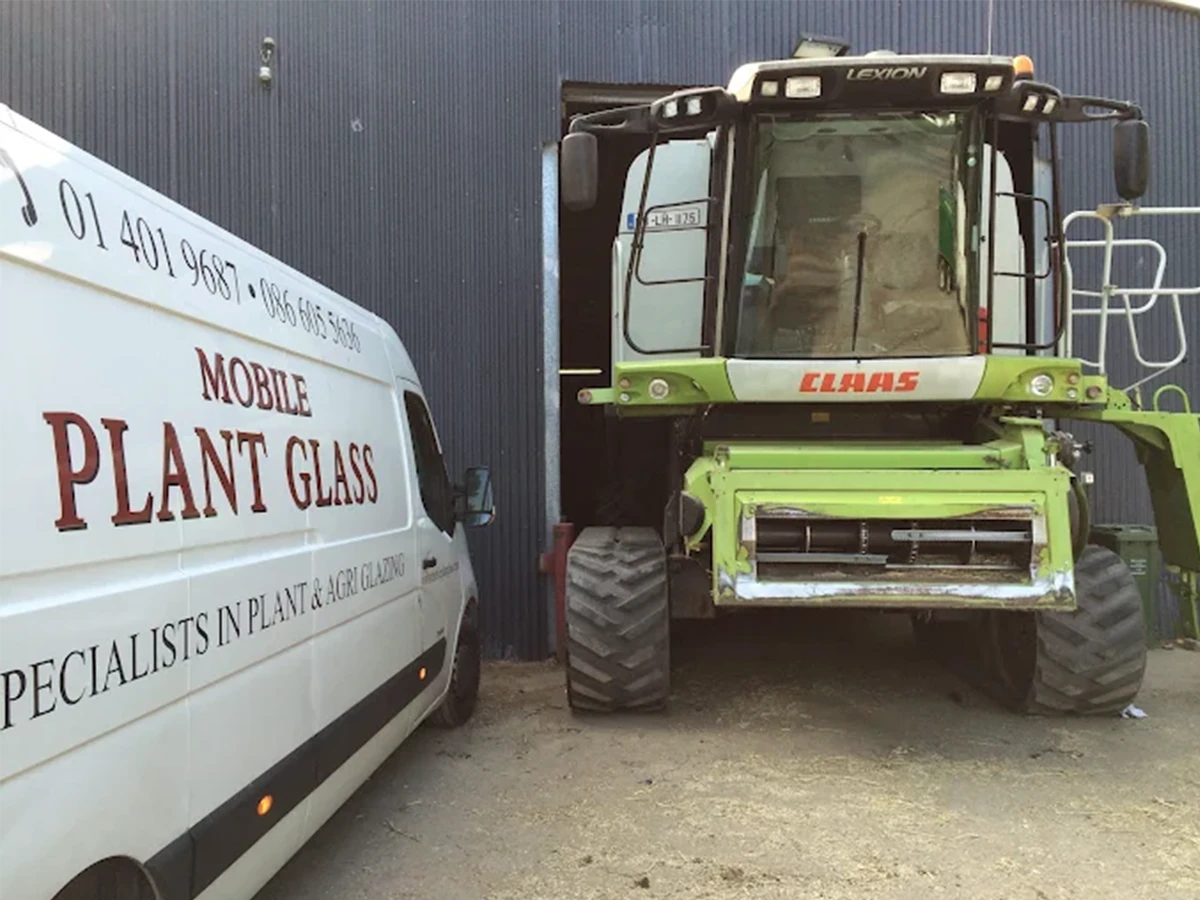 Mobile Plant Glass van on-site beside agricultural machinery during a cab glass job