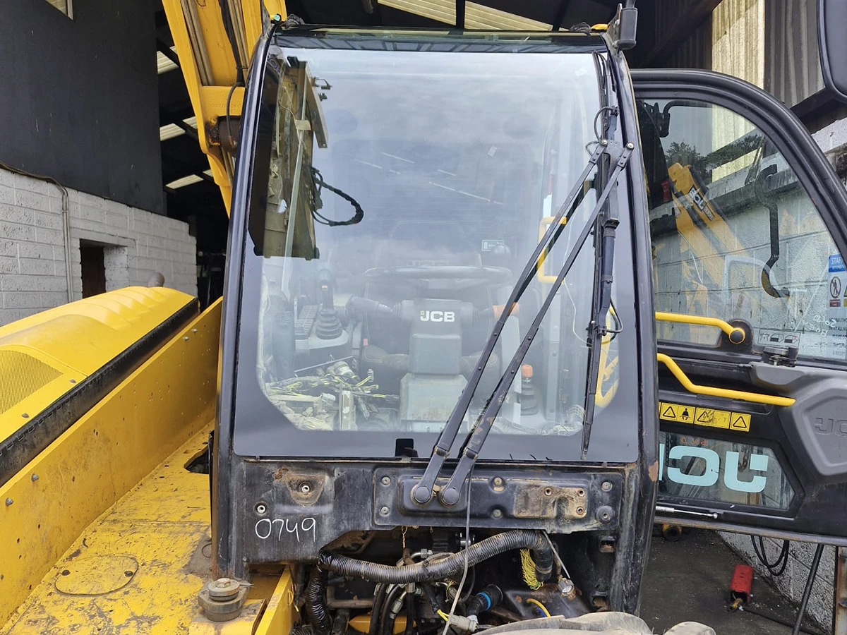 JCB backhoe loader windscreen replaced in the workshop