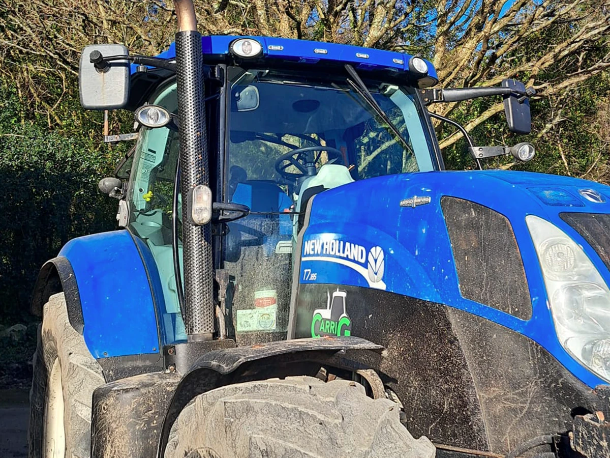 New Holland tractor with replacement cab glass